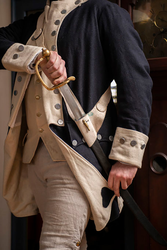 Revolutionary War Soldier holding an Officers Hanger from Samson Historical